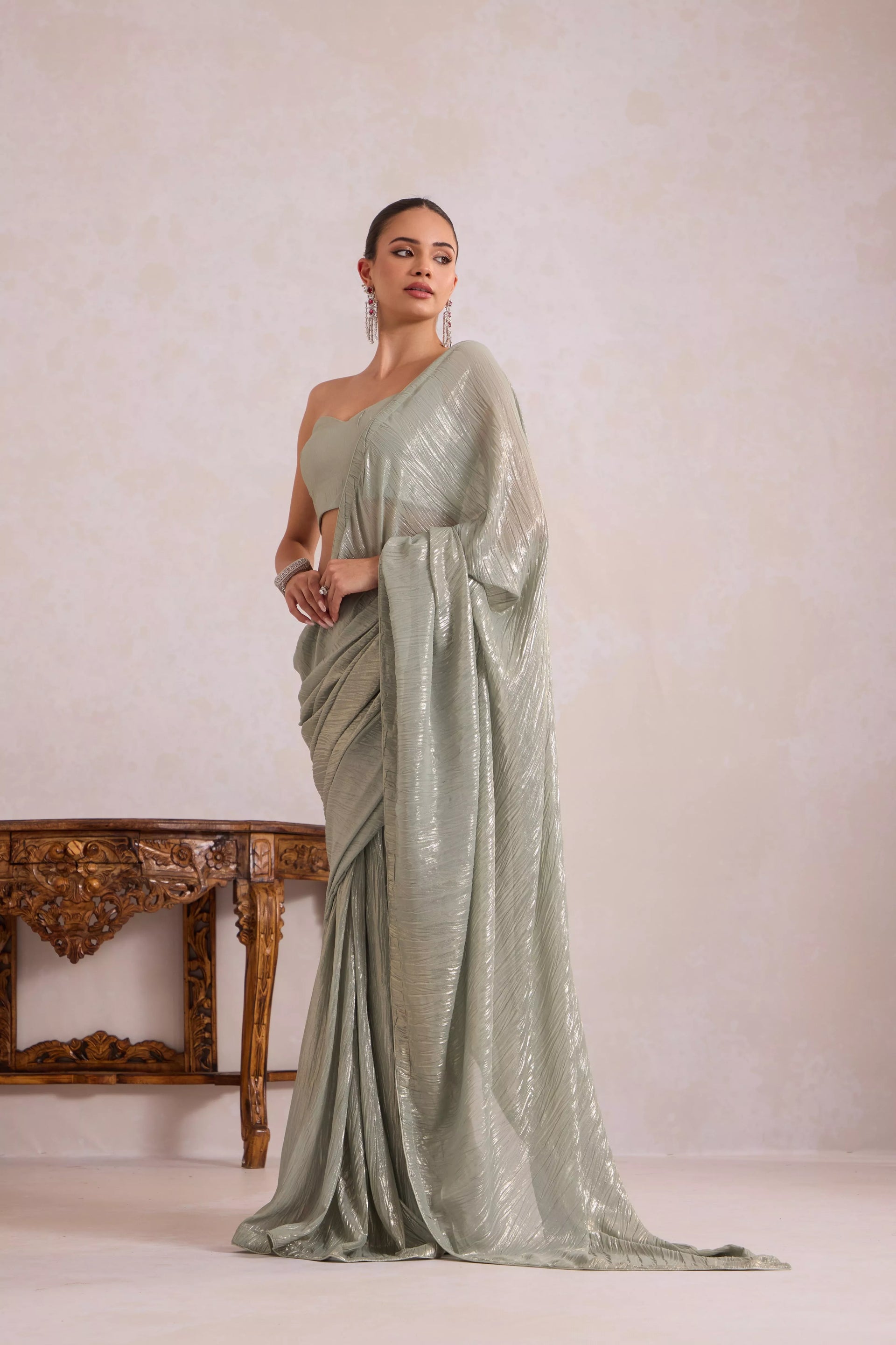 Mettalic green saree