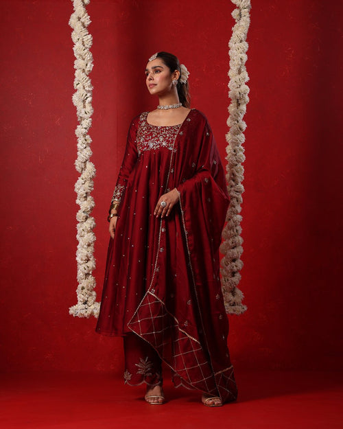 Maroon Embroidered Anarkali Suit by Agapi Clothing adorned with intricate ethnic detailing, crafted for elegant wedding functions, festive gatherings, and traditional celebrations.
