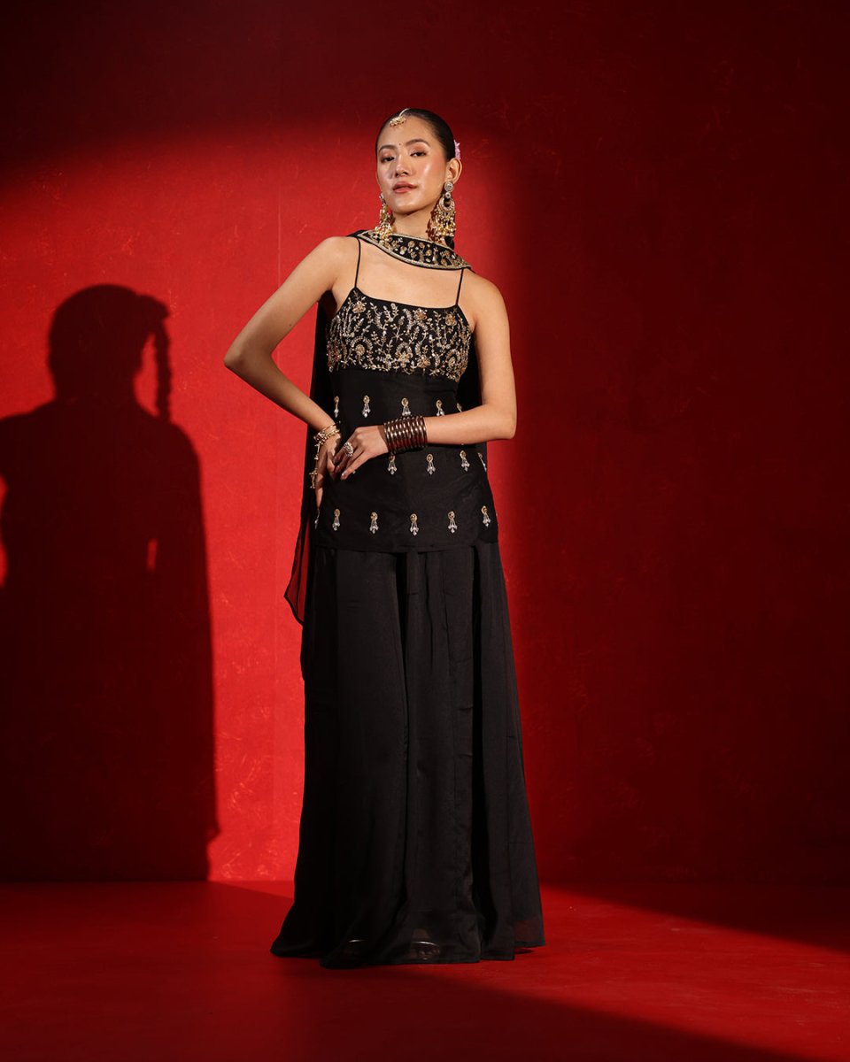 Midnight Black Sleeveless Sharara Suit by Agapi Clothing with contemporary elegance, statement embellishments, and a chic ethnic silhouette for cocktail nights and wedding festivities.