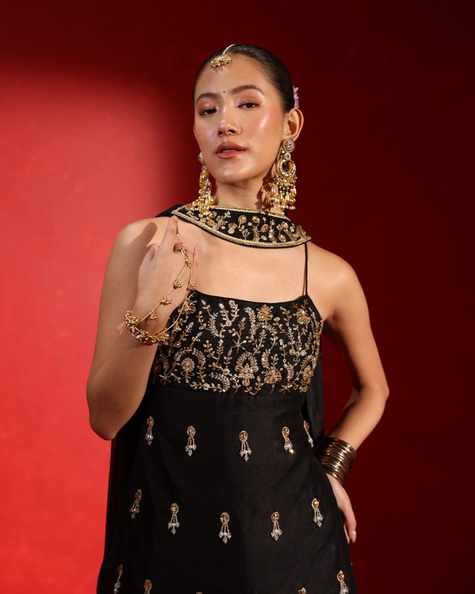 Midnight Black Sleeveless Sharara Suit by Agapi Clothing with contemporary elegance, statement embellishments, and a chic ethnic silhouette for cocktail nights and wedding festivities.