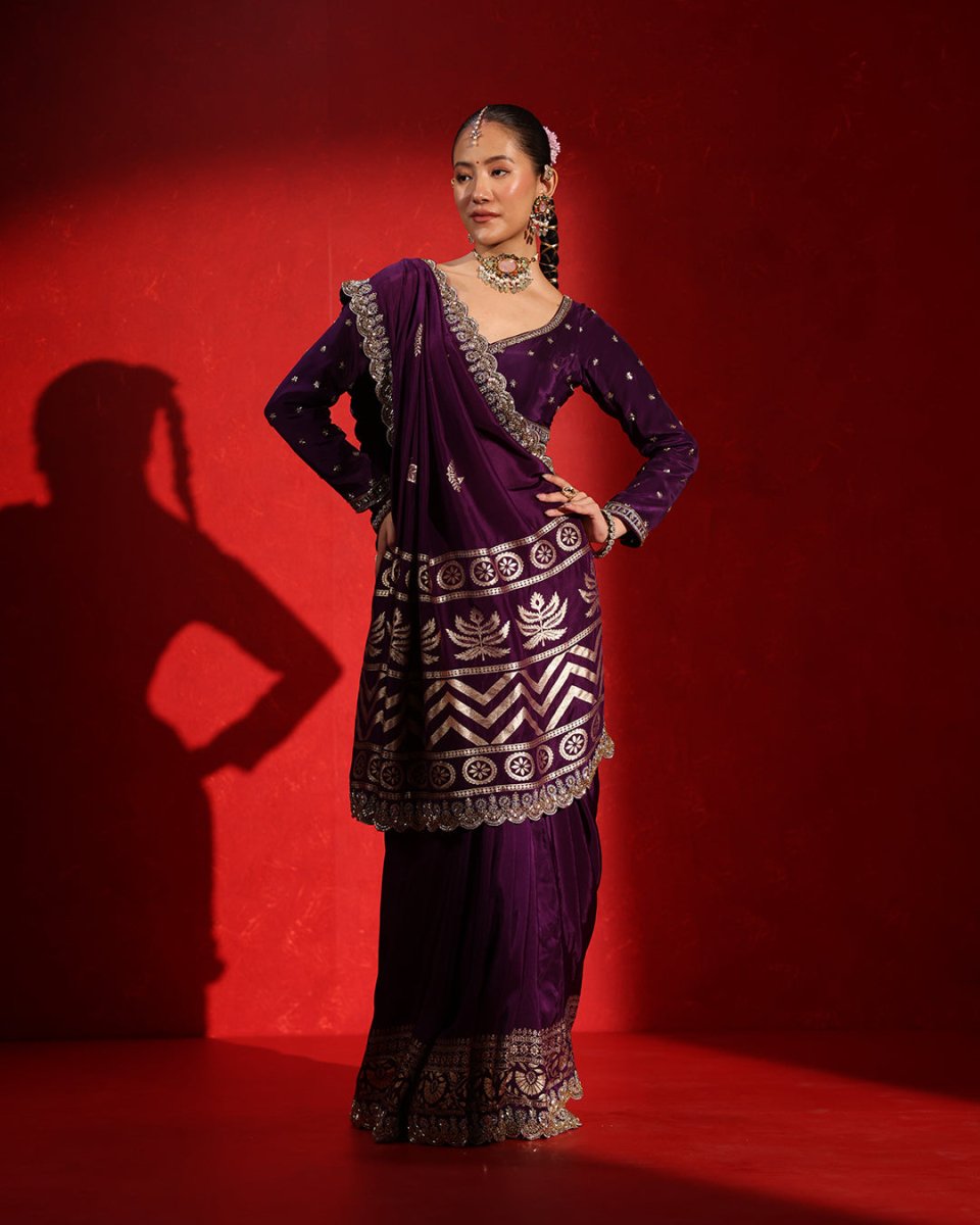 Maharani Deep Plum Saree by Agapi Clothing showcasing regal elegance, rich woven detailing, and a luxurious drape for weddings, receptions, and festive celebrations.